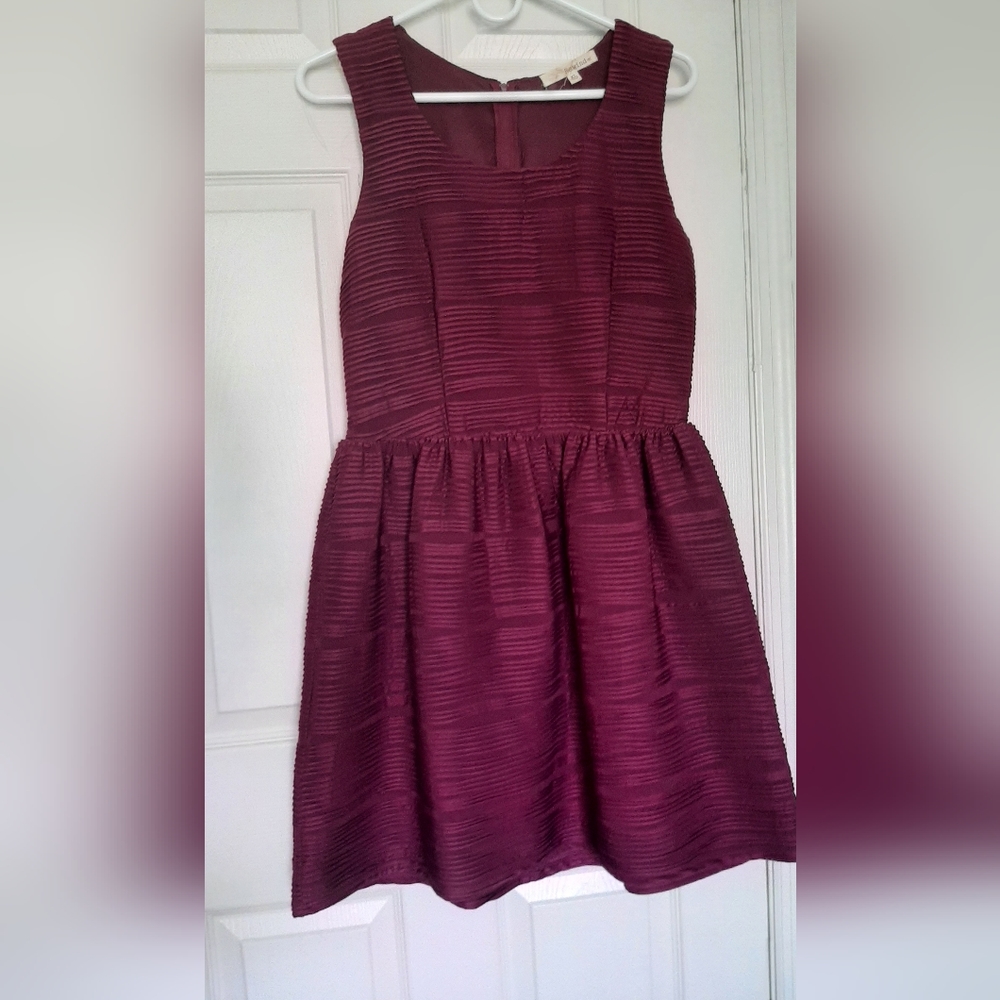 Brand is Reaind. Burgundy color XL